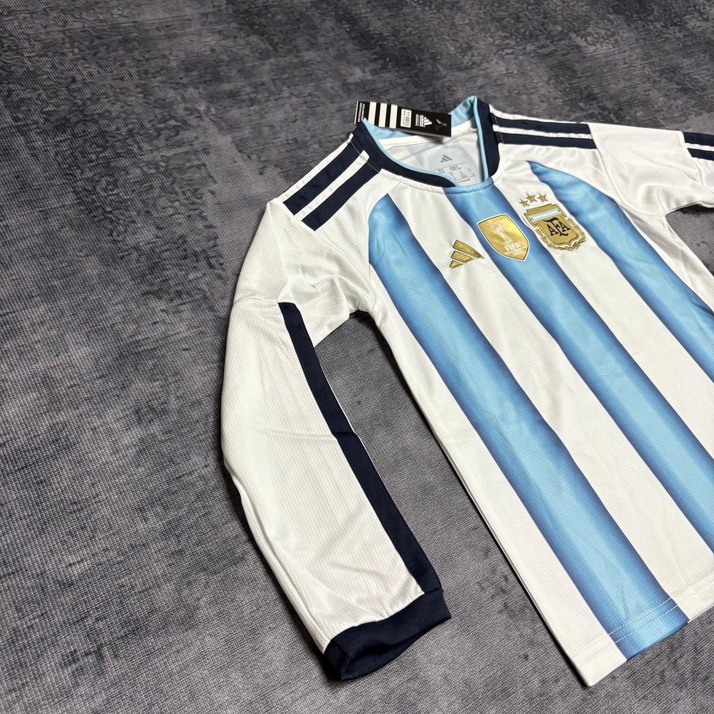 ARGENTINA MUNDIAL I 2026 CONJUNTO INFANTIL (MANGA LARGA)